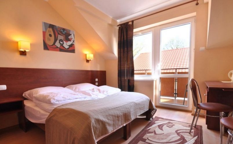 Pokoje i Domki "Omega"