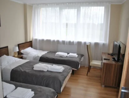 Pokoje i Apartamenty