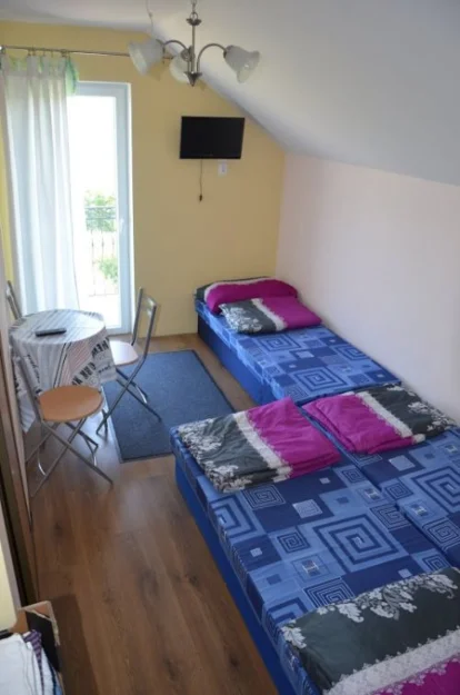 Zdjęcie Pokoje i Apartamenty #33