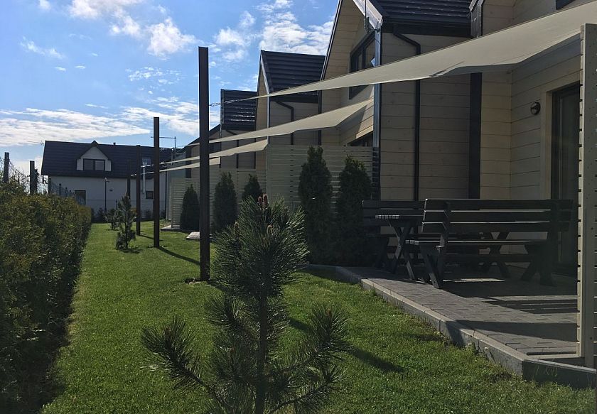 Domki JACHTOWA PARK - noclegi Grzybowo