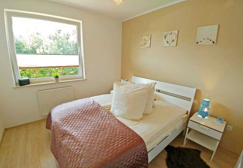 Komfortowy apartament z ogr&oacute;dkiem 10