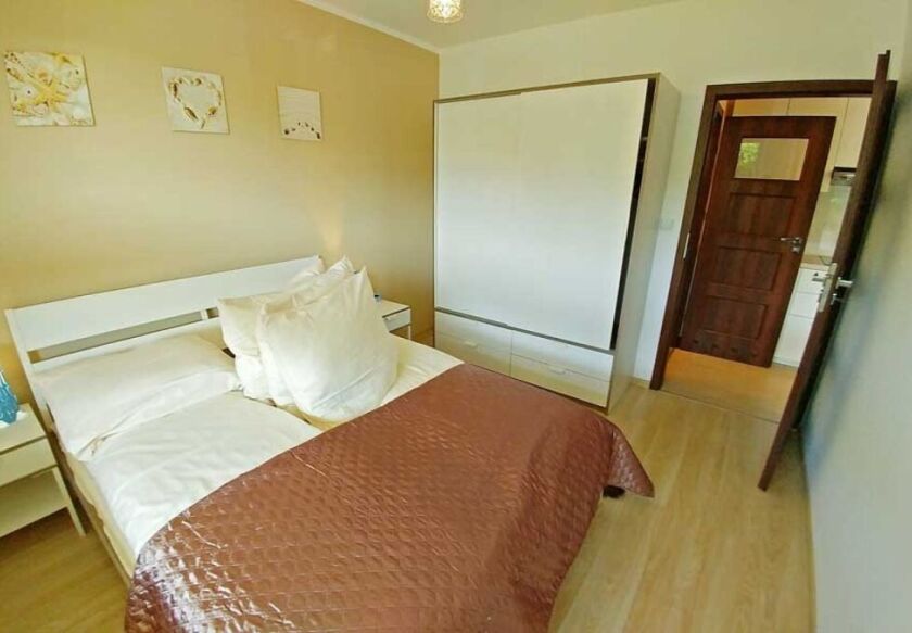 Komfortowy apartament z ogr&oacute;dkiem 11