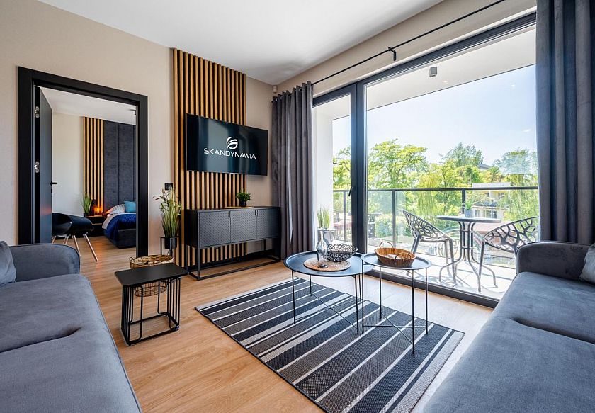 Nowe Domki i Apartamenty Skandynawia z basenem - noclegi Dąbki